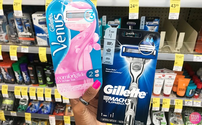 A Person Holding Gillete Venus and Marc3 Razors in an Aisle at Walgreens