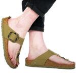 A Person Wearing Birkenstock Gizeh Big Buckle Canvas Sandals