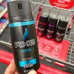 Hand Holding an Axe Body Spray